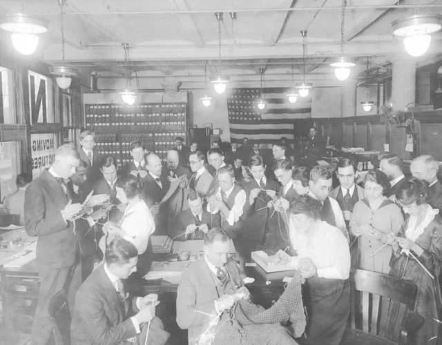 Knitting by Universal Motion Picture Company employees, 1917, published by the New York Herald. Photo via Piecework Magazine