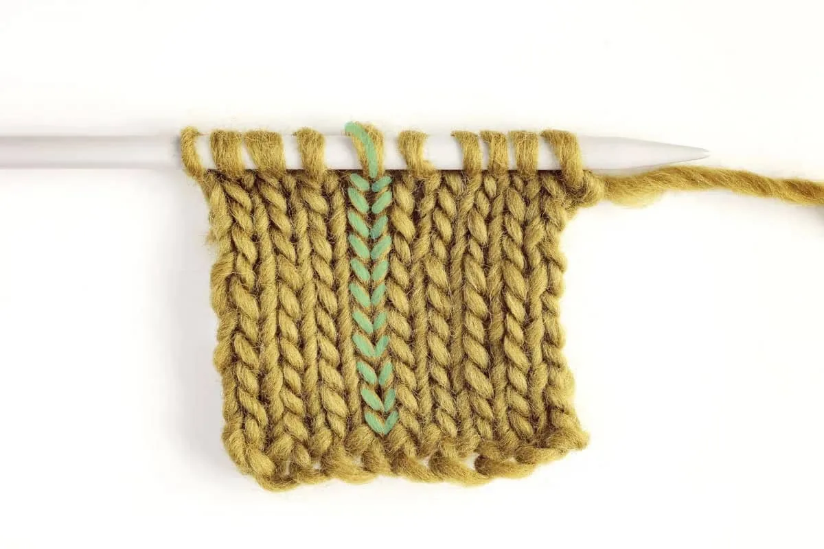 A column of knit stitches
