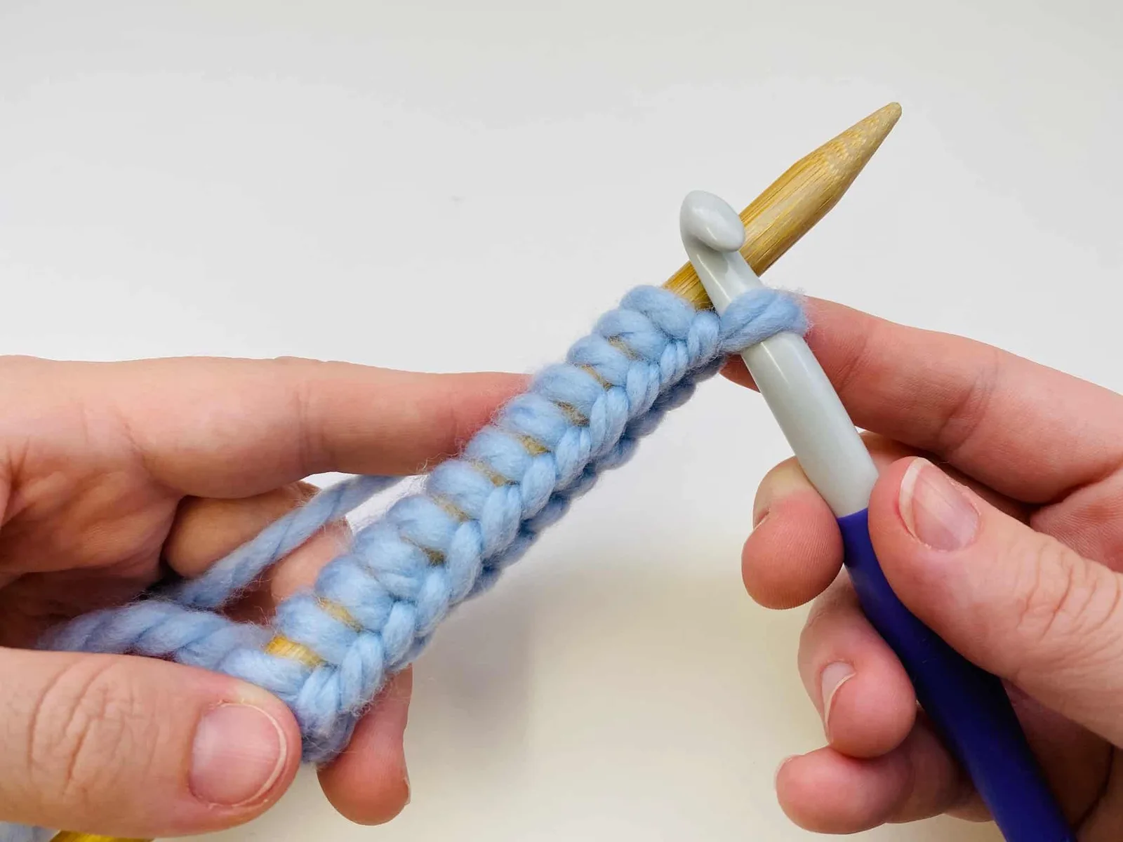 Using a crochet hook is one of our favorite cast on techniques (image via Love Life Yarn)